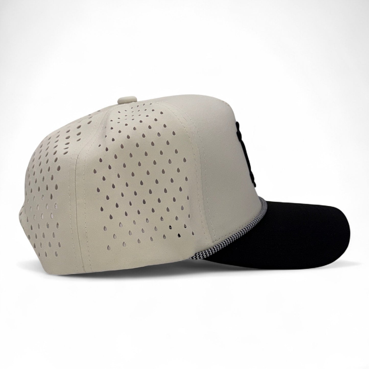 Beige cap with black visor on a white background