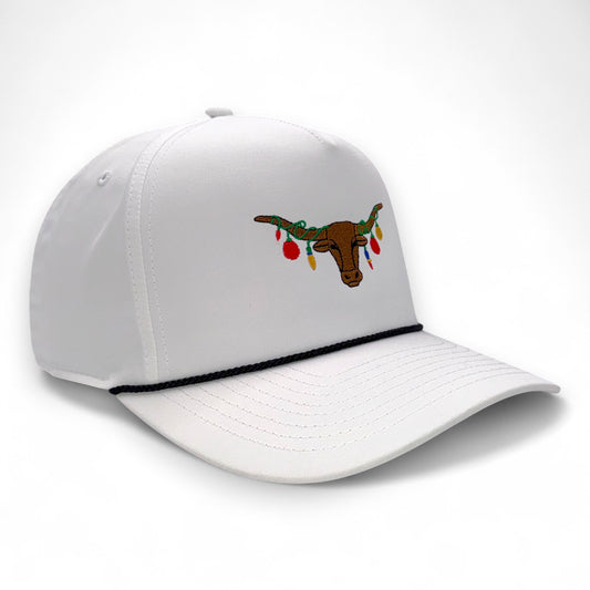 The Texas Mantel - Holiday trucker cap featuring longhorn with festive lights embroidery - white and black rope detail - side view