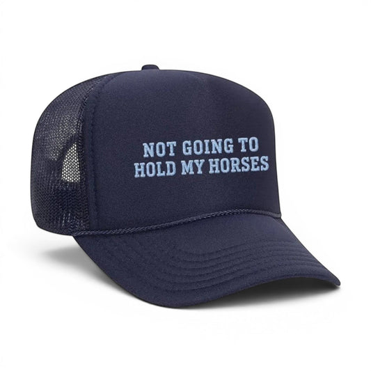 Mad Capper navy trucker hat with embroidered "Not Going To Hold My Horses" text in light blue. Features mesh back.