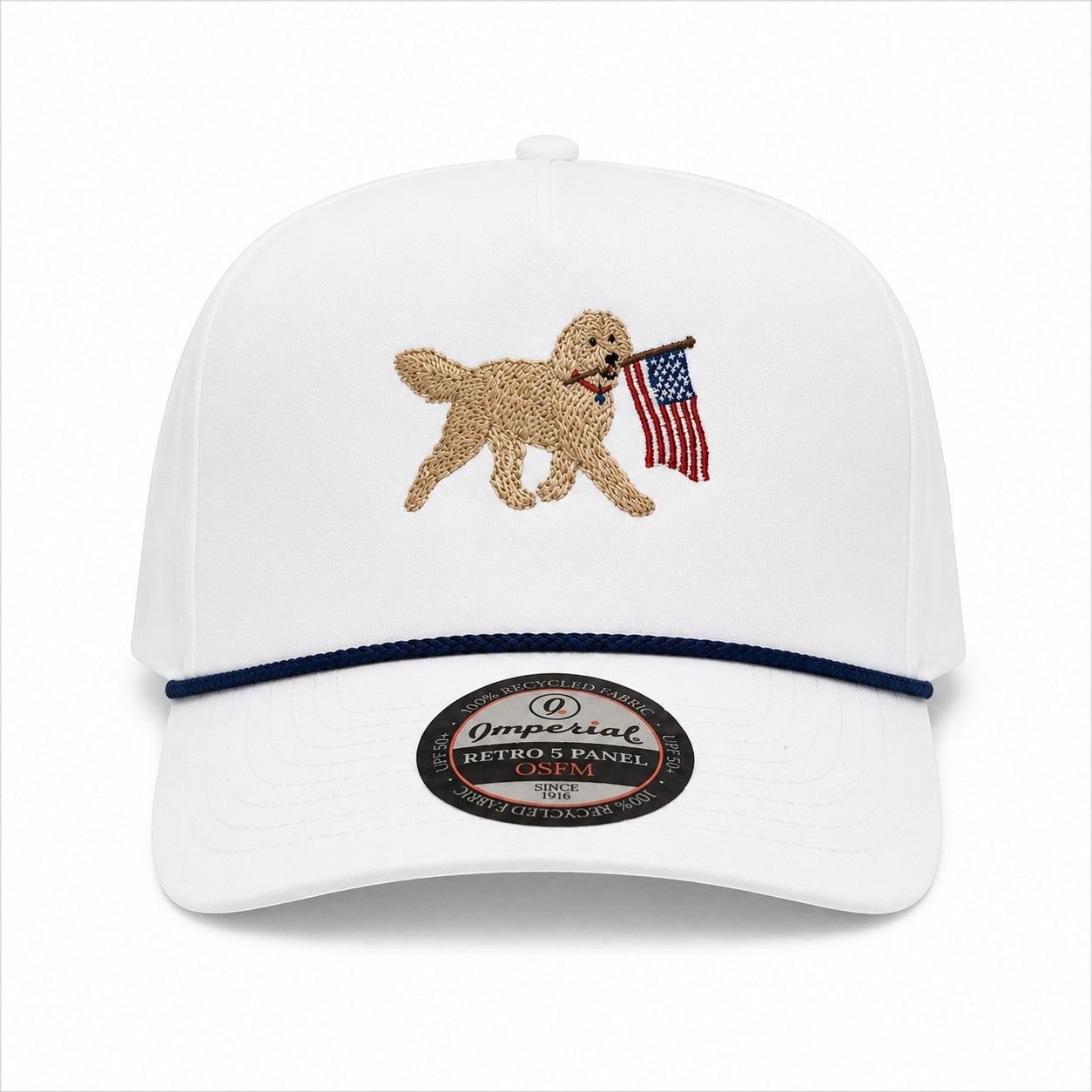 Mad Capper white embroidered golden doodle carrying American flag snapback hat with navy rope detail.