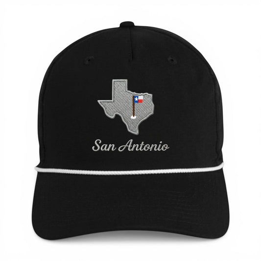 Mad Capper black structured trucker hat with Texas map embroidery and San Antonio text. Features a white rope detail and adjustable snapback.