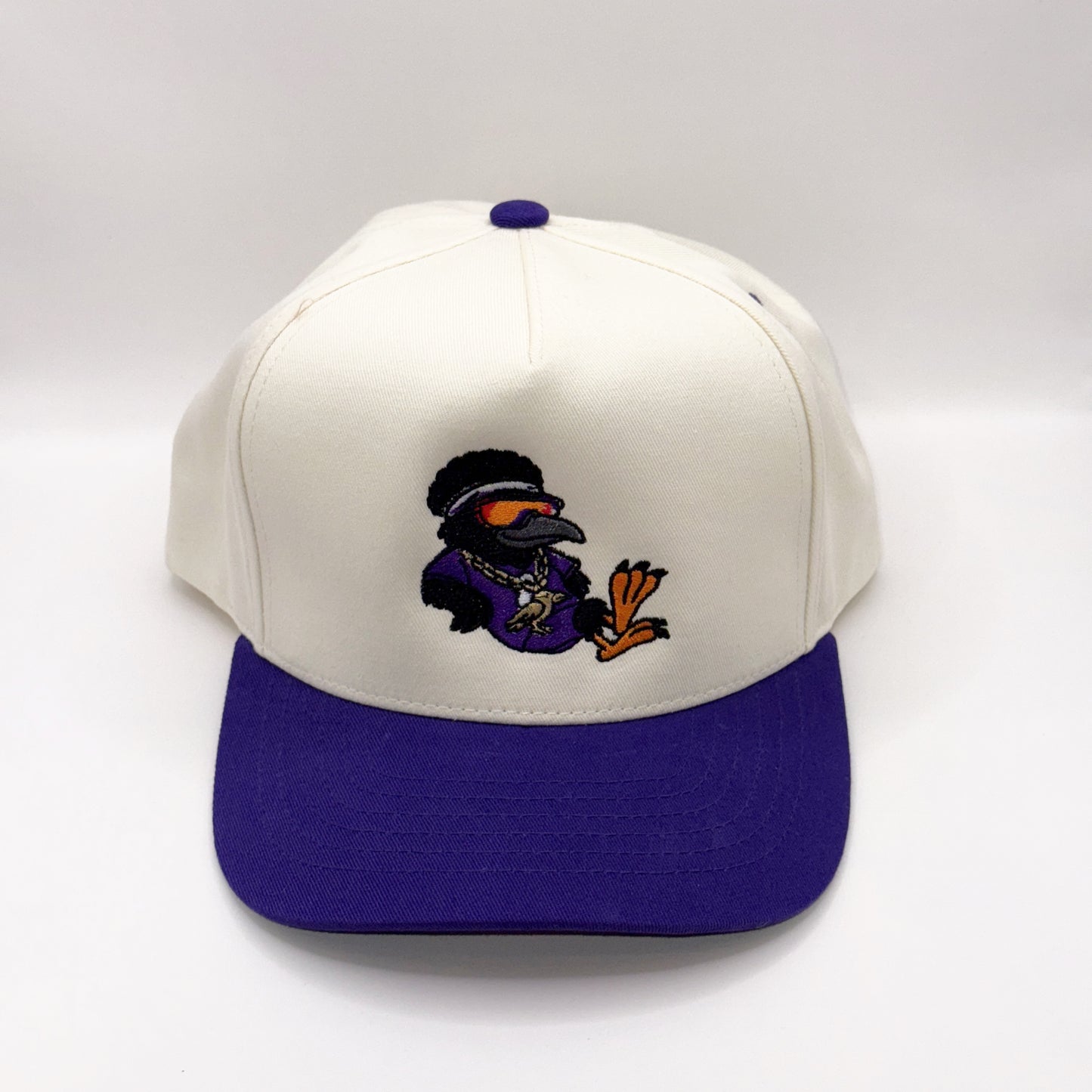 Lounging Raven Tan & Purple Baseball Cap