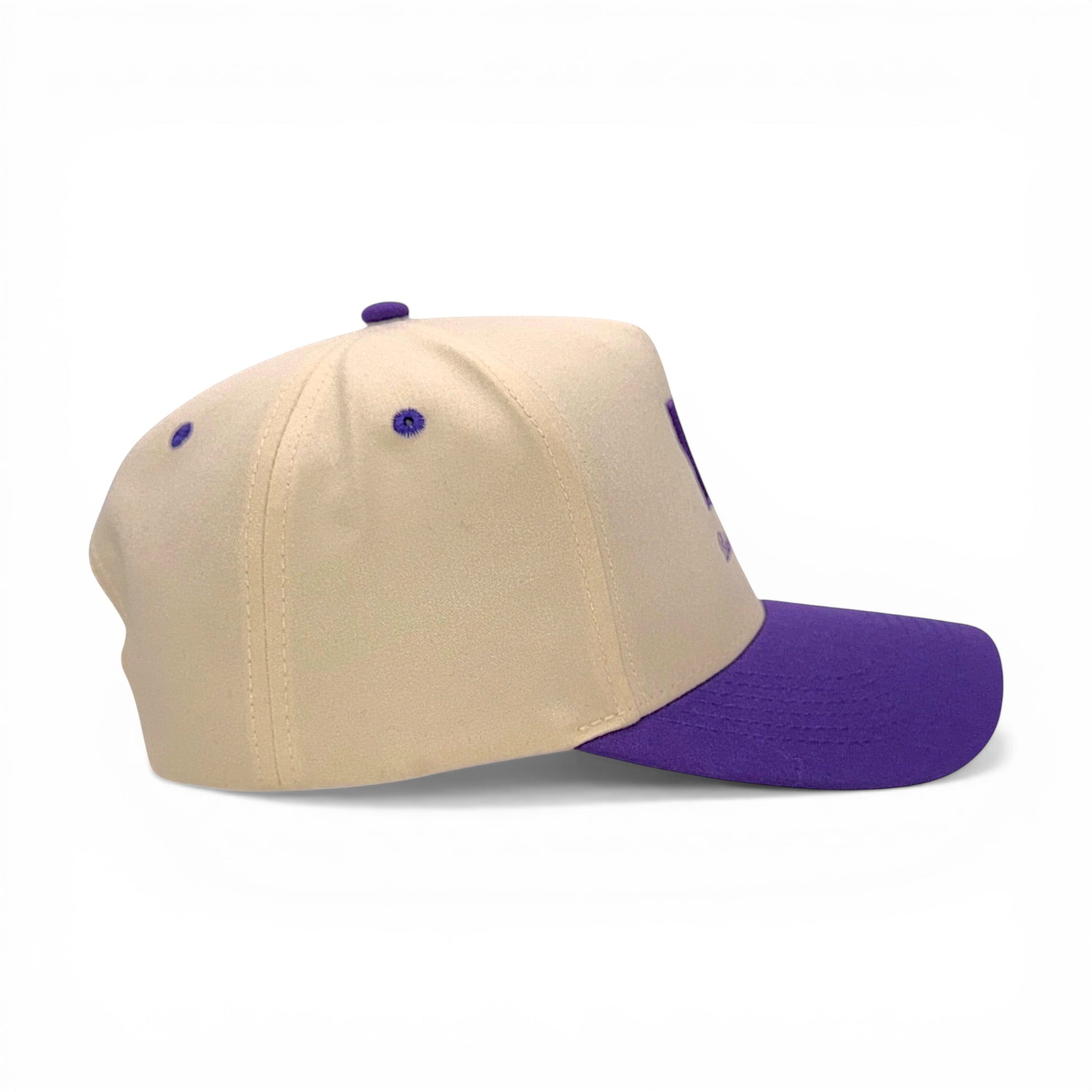 Beige and purple baseball cap on a white background
