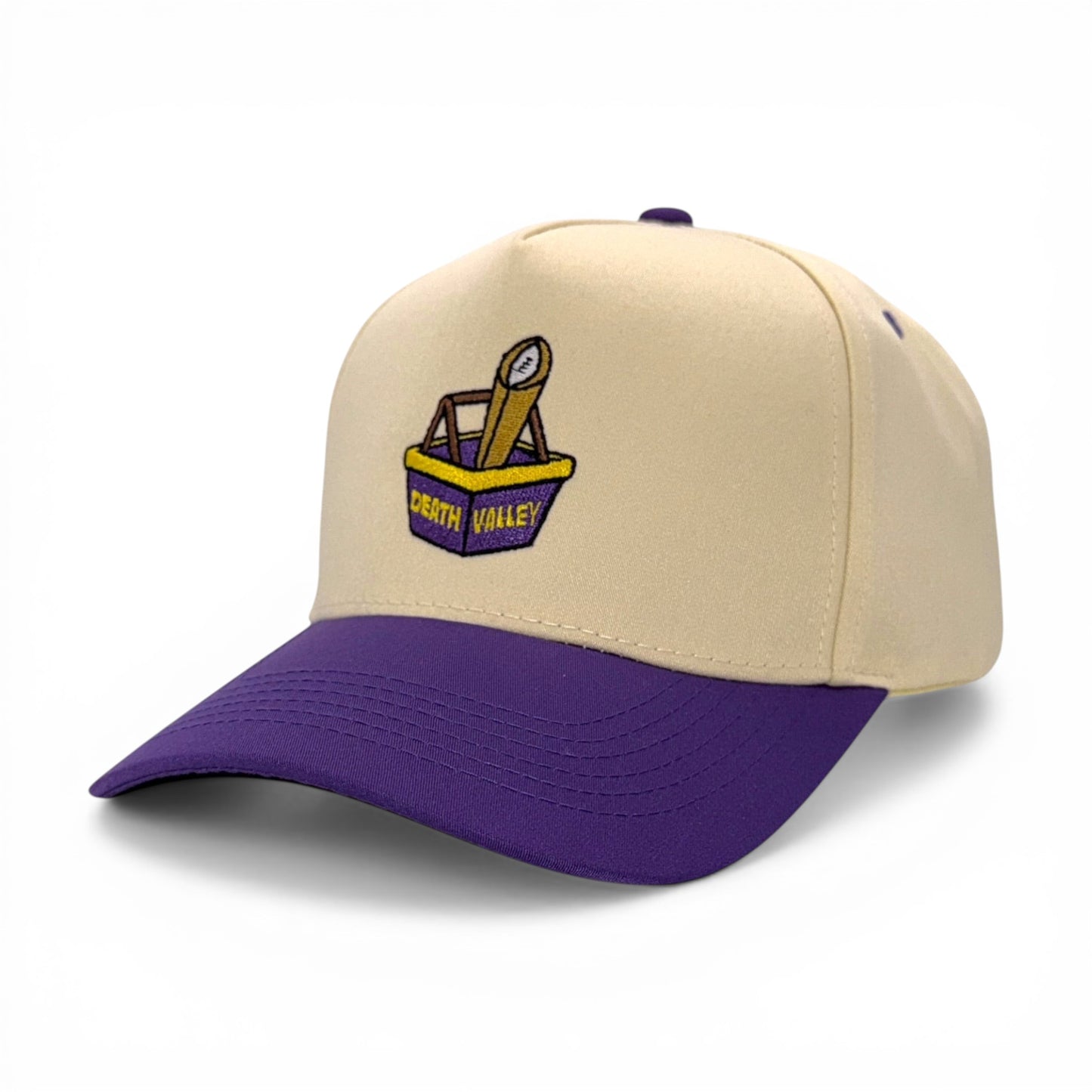 Beige and purple cap with a logo on a white background