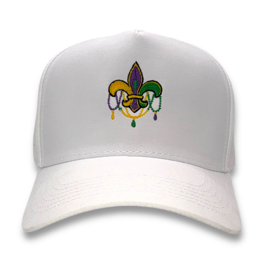 White cap with a colorful embroidered design on a white background