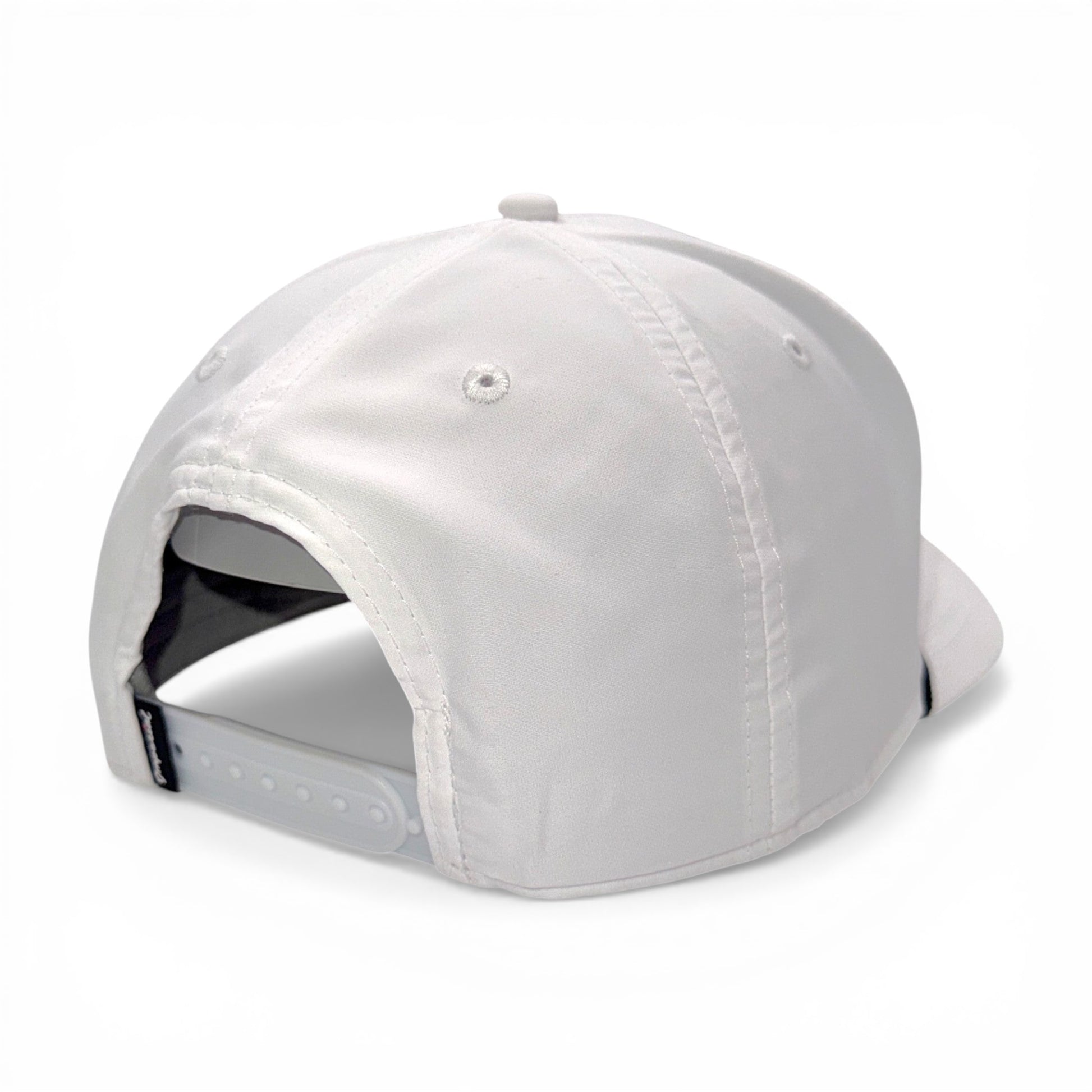Rear view of white snapback hat showing adjustable closure