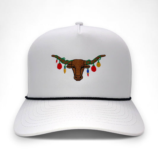The Texas Mantel - White trucker hat with embroidered Texas Longhorn wearing colorful Christmas lights - front view