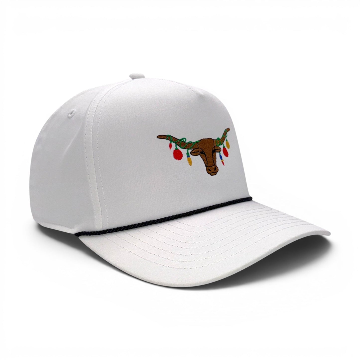 The Texas Mantel - Holiday trucker cap featuring longhorn with festive lights embroidery - white and black rope detail - side view