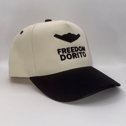 Cream and black snapback hat with embroidered B2 bomber silhouette and text ‘Freedom Dorito’