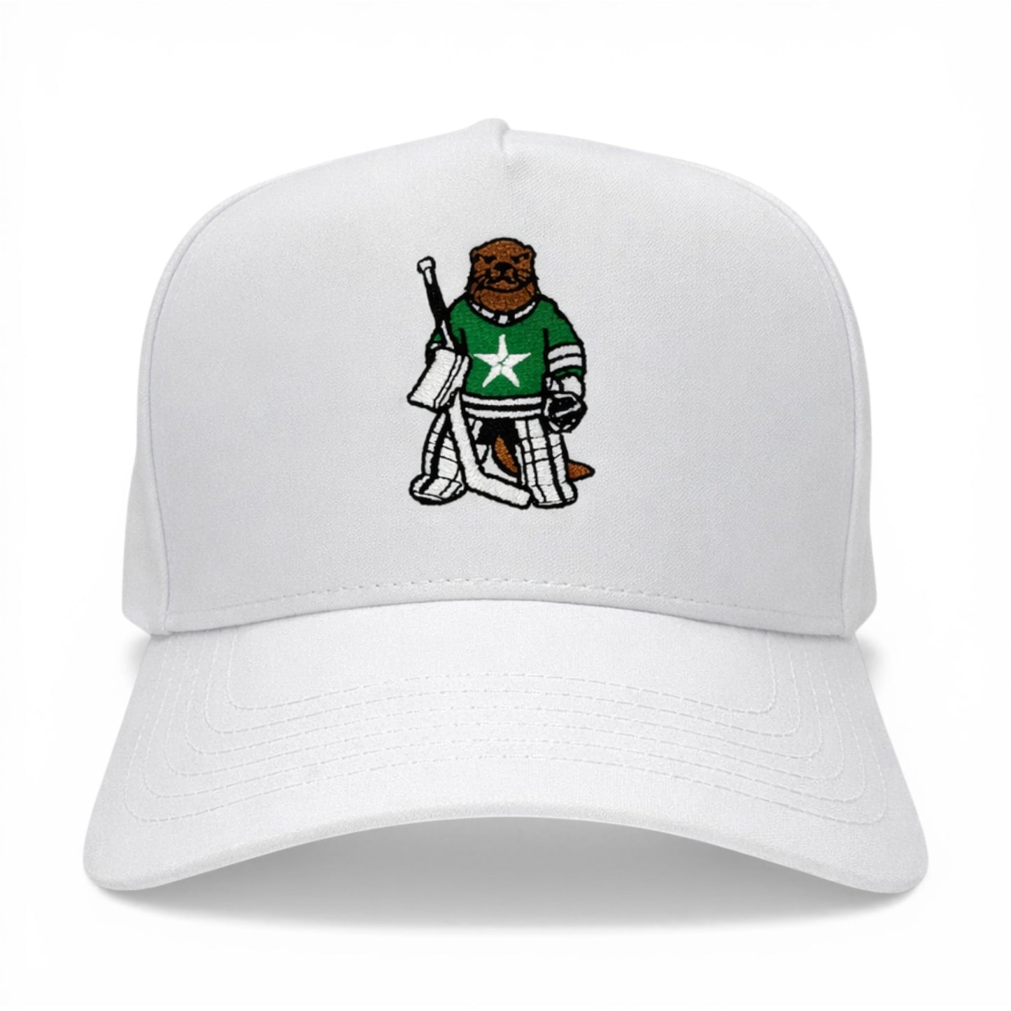 White cap with a cartoon bear hockey player design on a white background