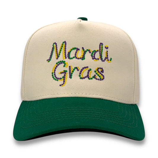 Beige and green cap with 'Mardi Gras' text in multicolor on a white background