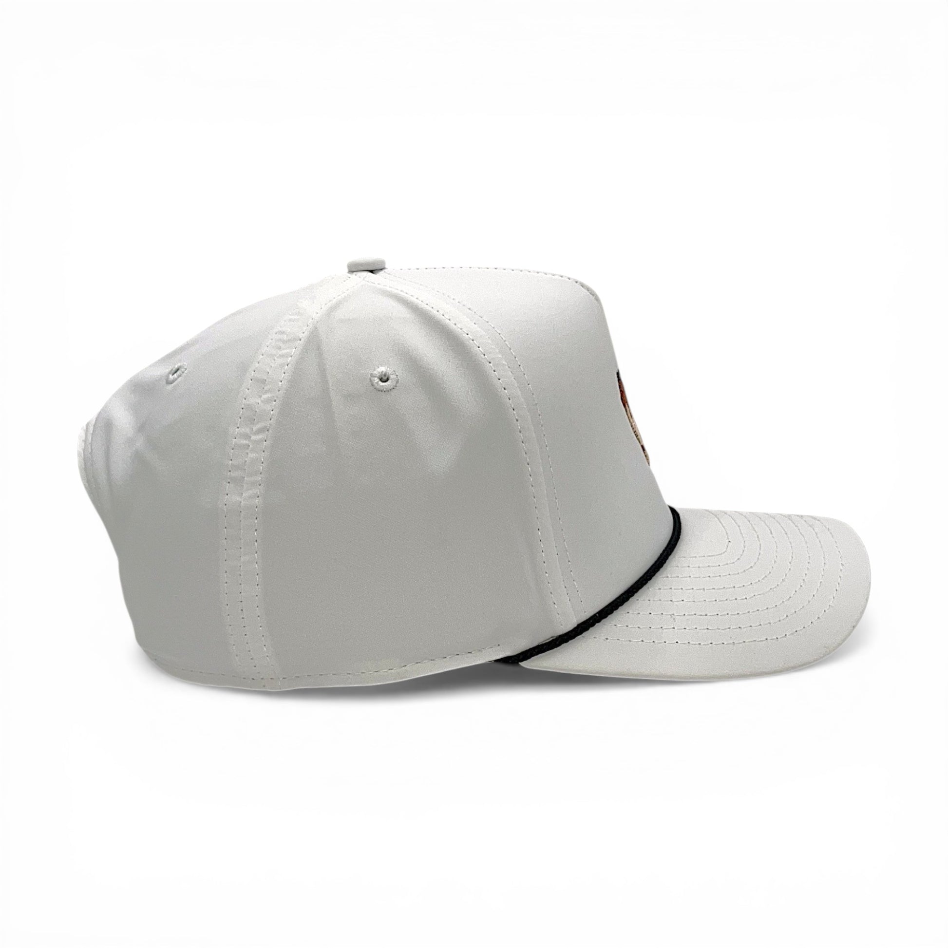 Side profile of white snapback rope hat with black rope trim and structured crown.