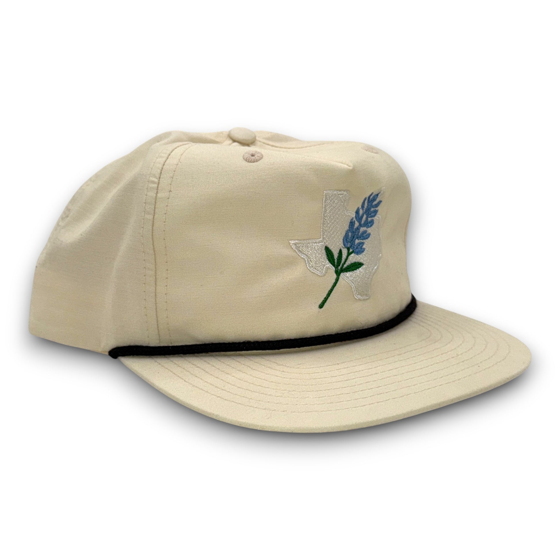 Beige cap with embroidered design on a white background