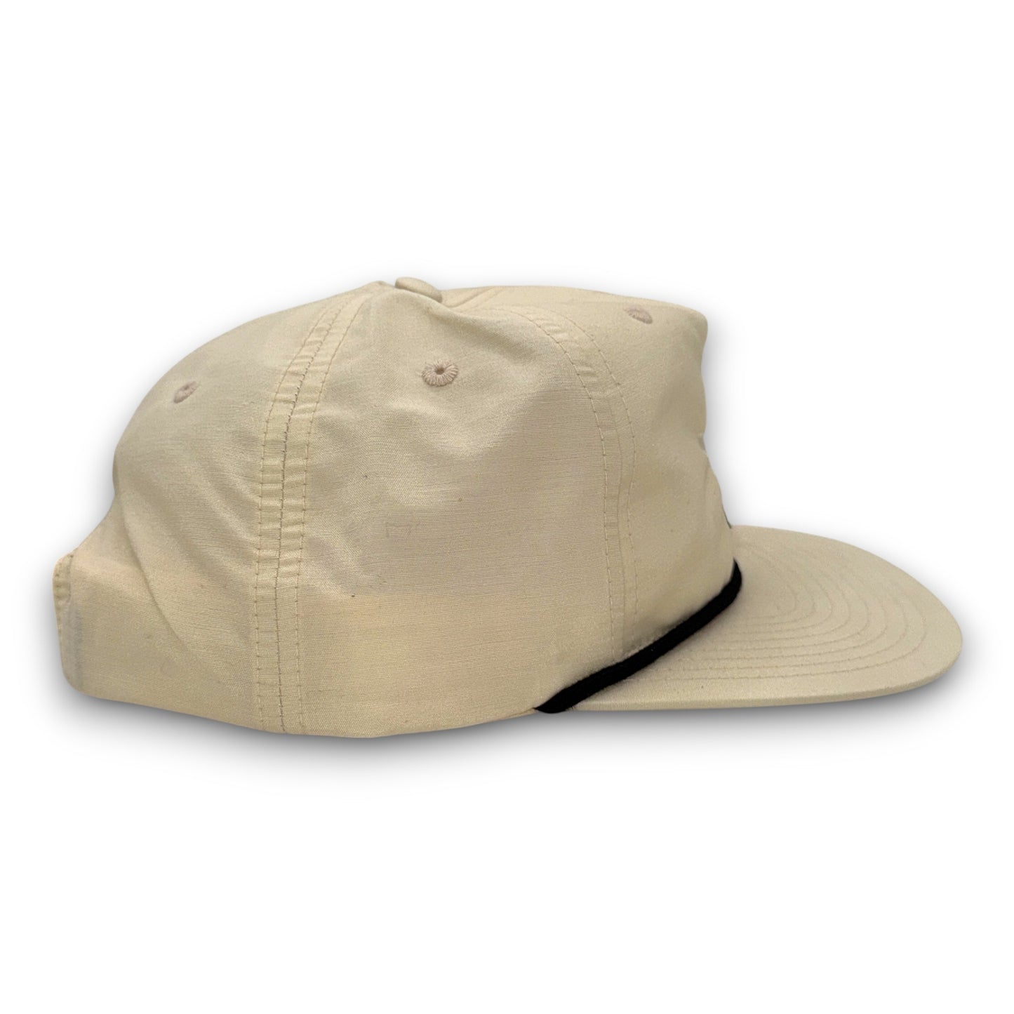 Beige hat with a black band on a white background