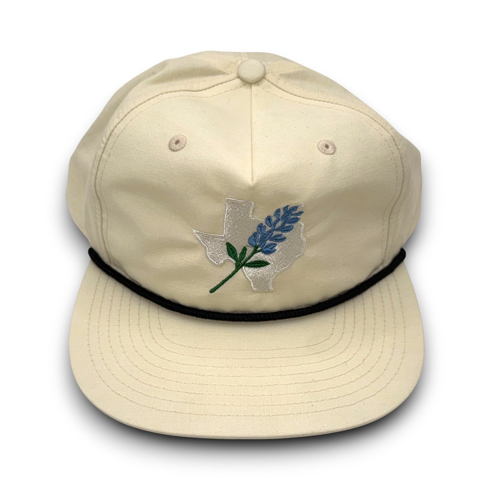 Beige cap with embroidered design on a white background