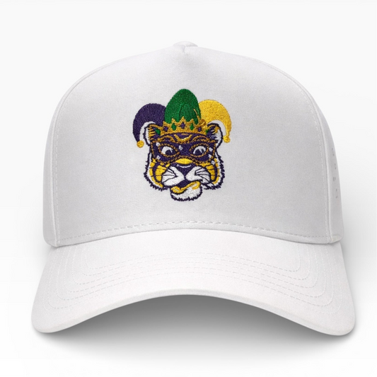 White cap with a tiger logo wearing a Mardi Gras mask on a white background