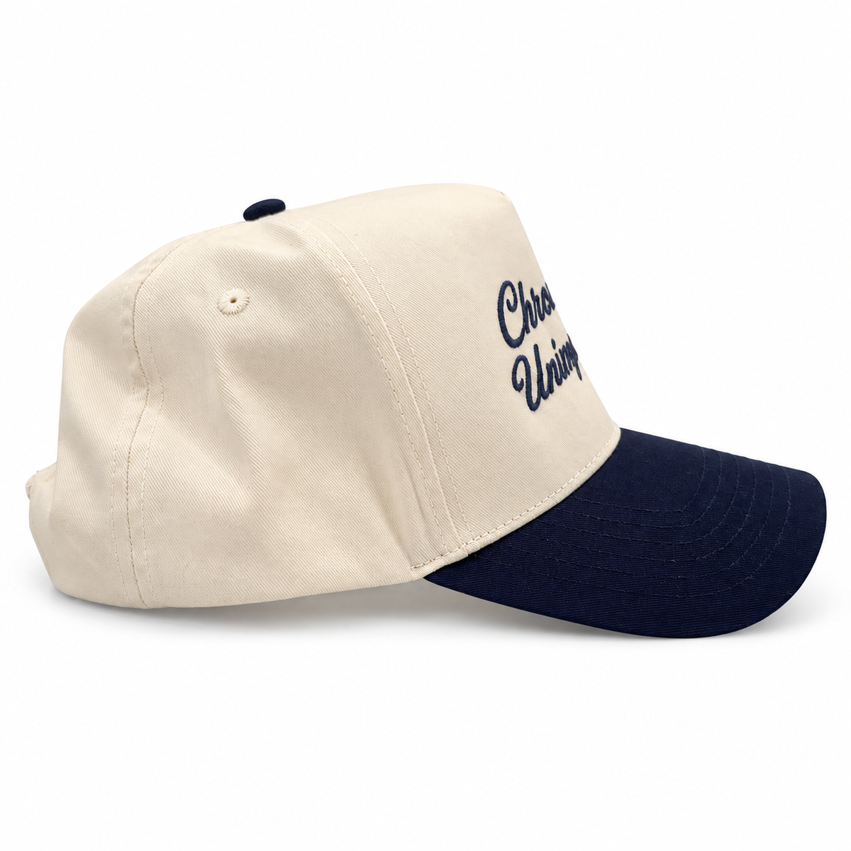 Mad Capper Chronically Unimpressed Classic hat in Natural/Navy, side profile showing natural crown and navy visor
