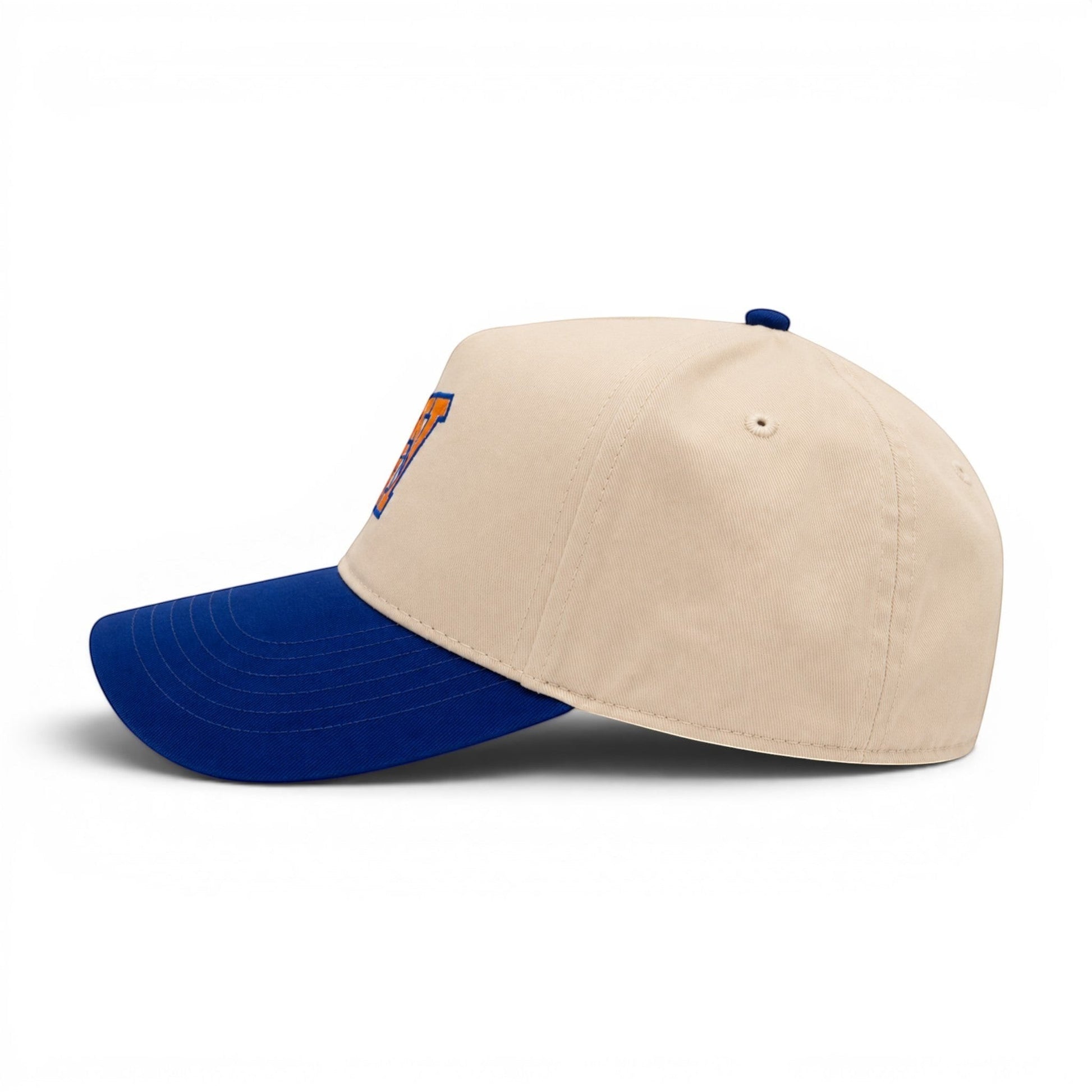 Mad Capper beige and blue structured snapback hat with embroidered orange "NY" logo. Baseball cap style.