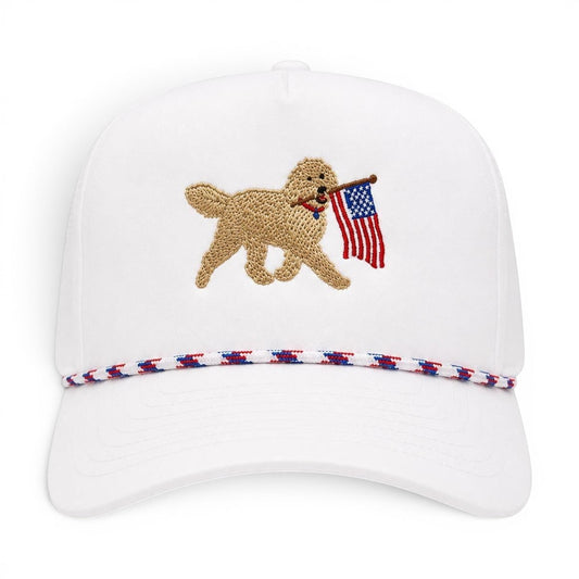 Mad Capper white snapback hat with embroidered golden doodle carrying American flag and red, white & blue rope detail.