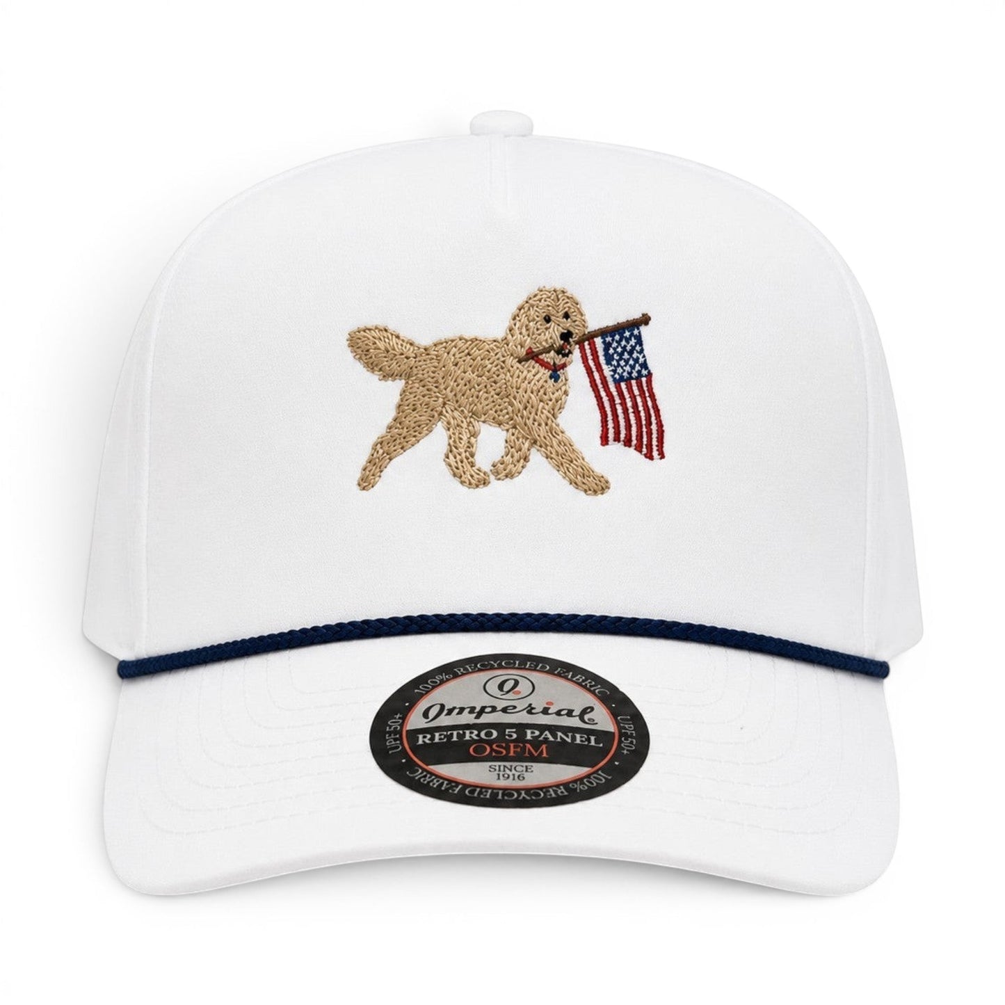 Mad Capper white embroidered golden doodle carrying American flag snapback hat with navy rope detail.