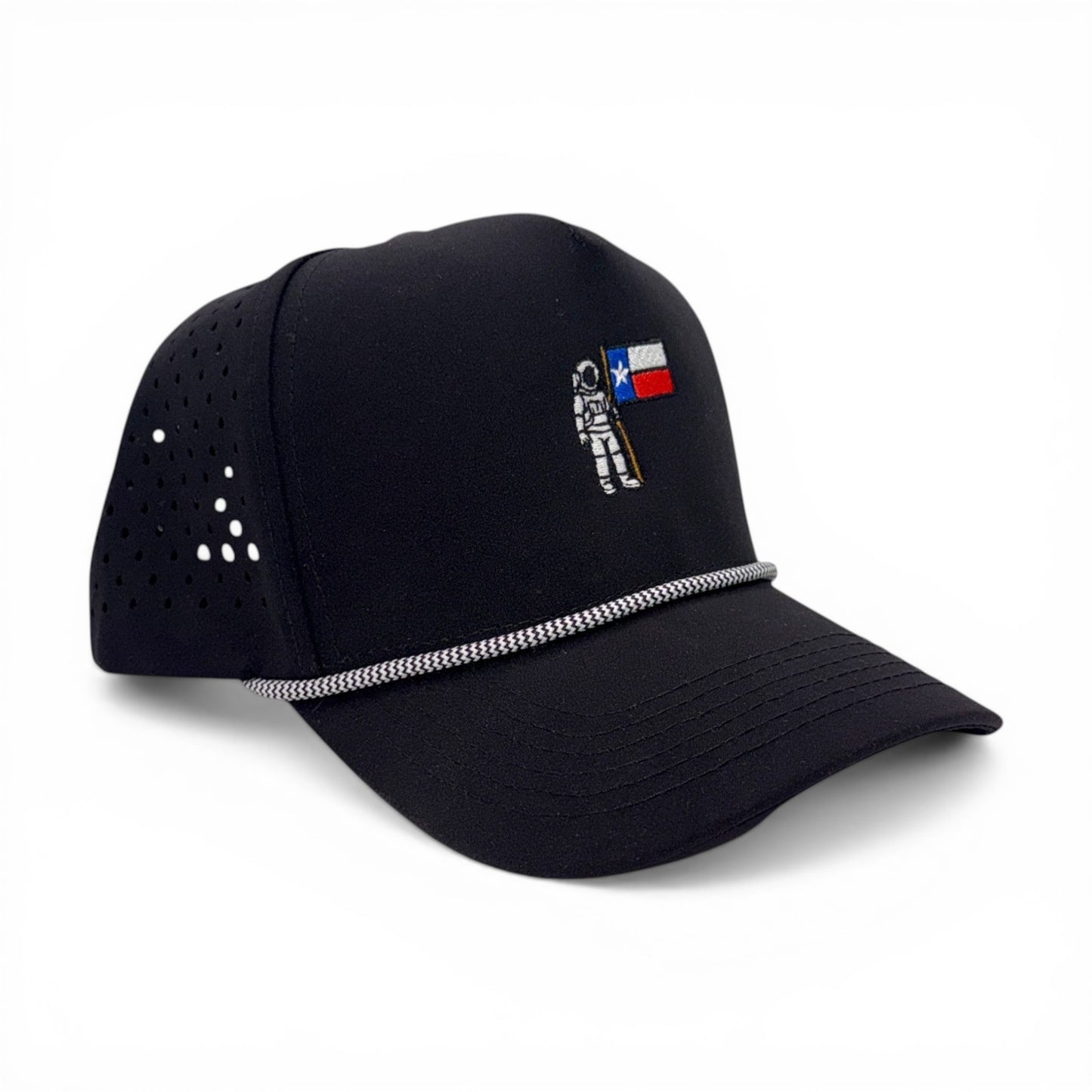 Mad Capper black rope cap with astronaut holding Texas flag embroidery and perforated side panels.