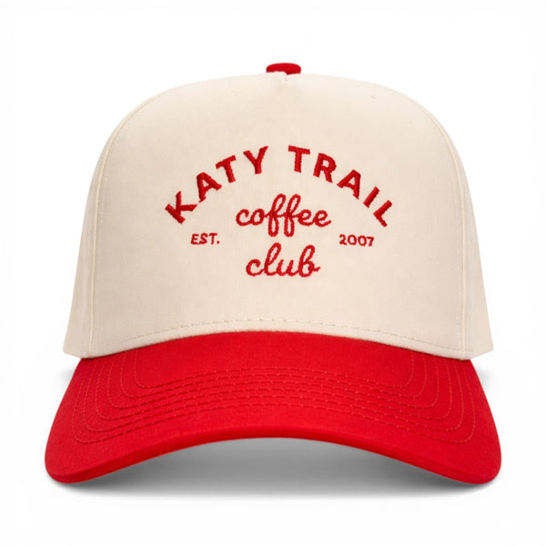 Mad Capper cream and red embroidered Katy Trail Coffee Club baseball cap with adjustable snapback closure.