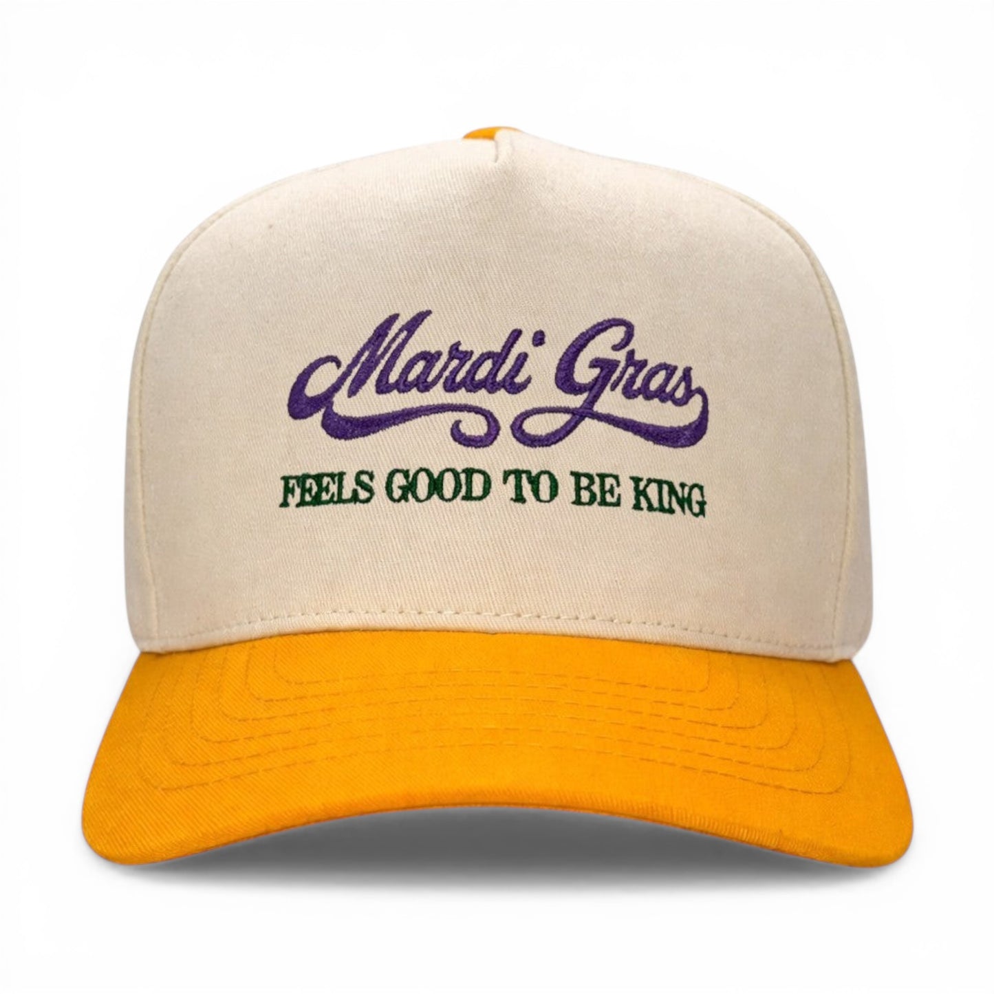 Mad Capper Mardi Gras King Hat with cream crown and yellow brim, embroidered with purple and green text.